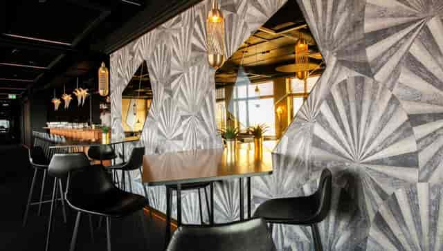 Art Deco cocktail bar in MINOX, ideal for upscale networking events and corporate receptions.