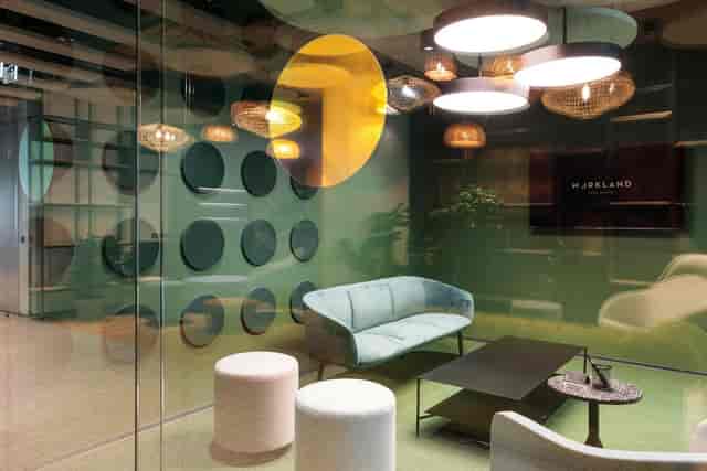 Private office with lounge seating for networking and creative brainstorming sessions.