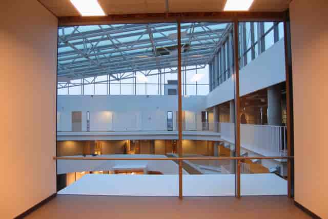 Modern Main Hall atrium for corporate networking and event receptions.