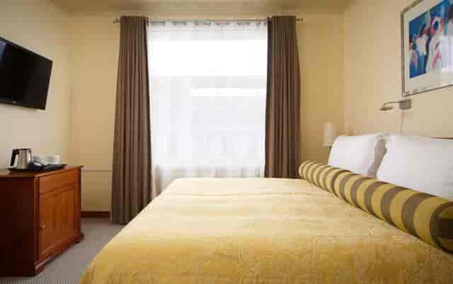 Standard hotel room at Radisson Blu Ridzene, ideal for business travel and corporate event lodging.