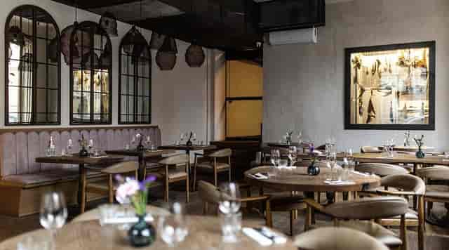 High-end restaurant dining room in Riga for corporate events and luxury business networking.