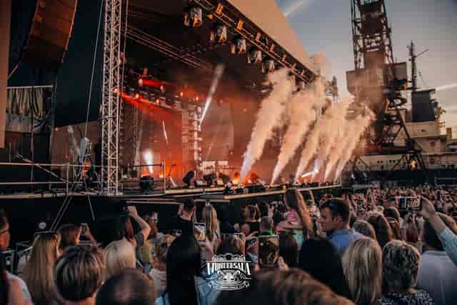 Main Hall festival stage with CO2 effects and professional lighting for outdoor event production.