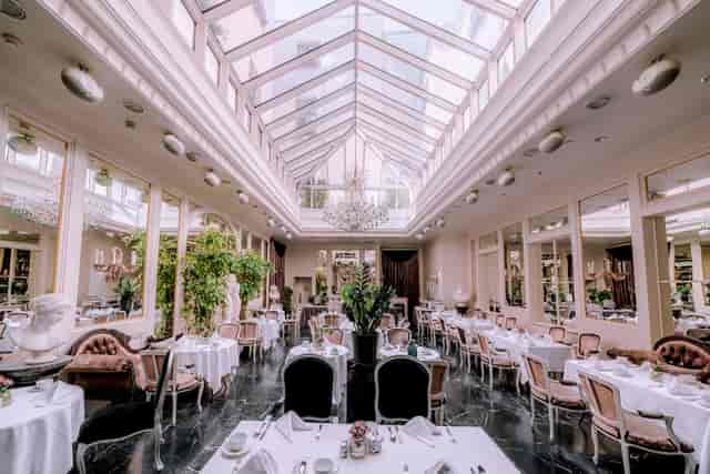 Pils Bar glass atrium venue for upscale luncheons and bridal showers.