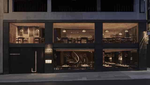 Modern restaurant with large windows, ideal for corporate events and private parties.
