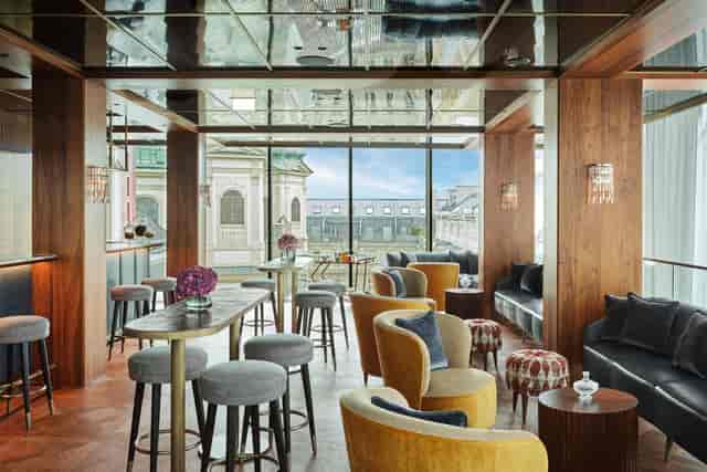Neue Hoheit Brasserie lounge with city views for VIP networking and corporate cocktail events.