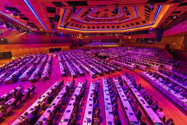 Classroom-style plenary session in Austria Center Vienna ballroom for professional conferences.