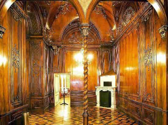 Maria Theresien Saal: Historic boardroom with wood paneling for event venue or gala space.