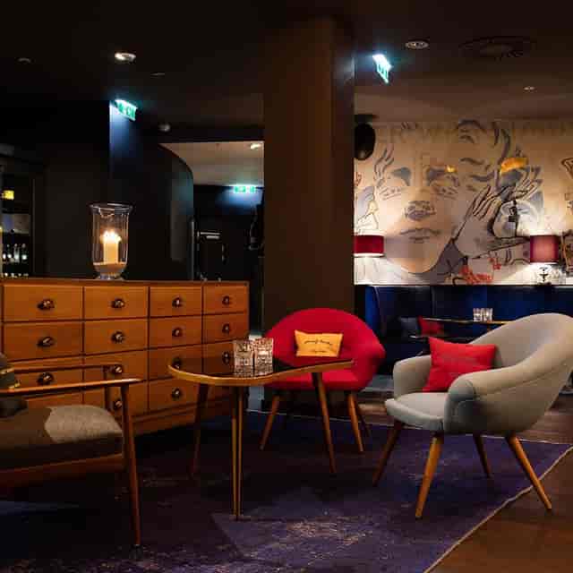 Upscale hotel breakfast restaurant for VIP meetings and networking events.