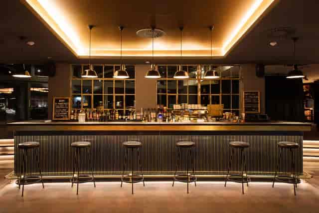 Rooftop garden bar at Ruby Marie Hotel: Upscale networking lounge for corporate events.