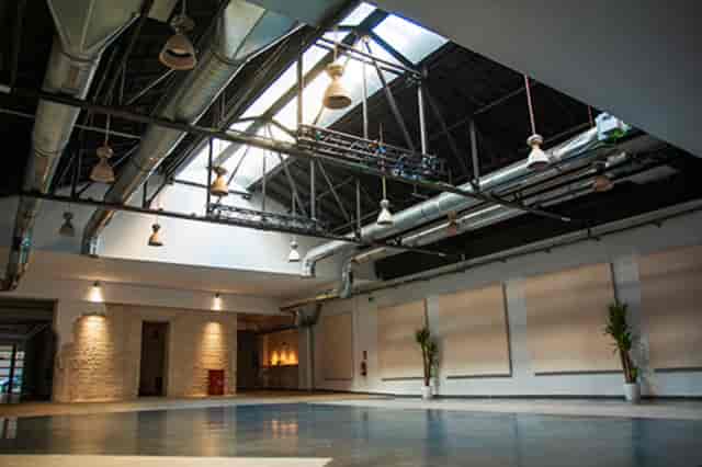 Sala Principal at Espacio Downtown: industrial-chic event venue with skylights for creative events.