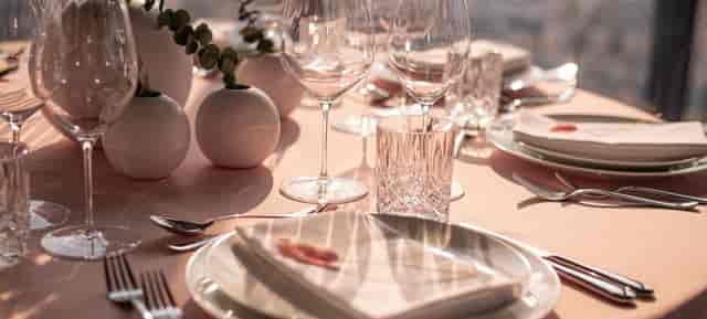 Modern minimalist dining room setup for luxury event and wedding venue.