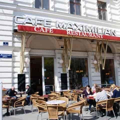 Hotel Maximilian outdoor cafe terrace for informal networking and conference social hours.