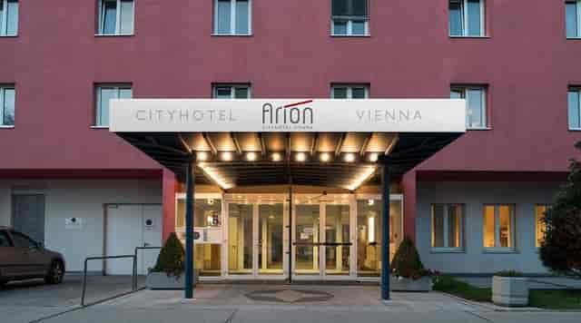 Arion City Hotel entrance, functional facade, ideal for corporate event logistics and business stays.