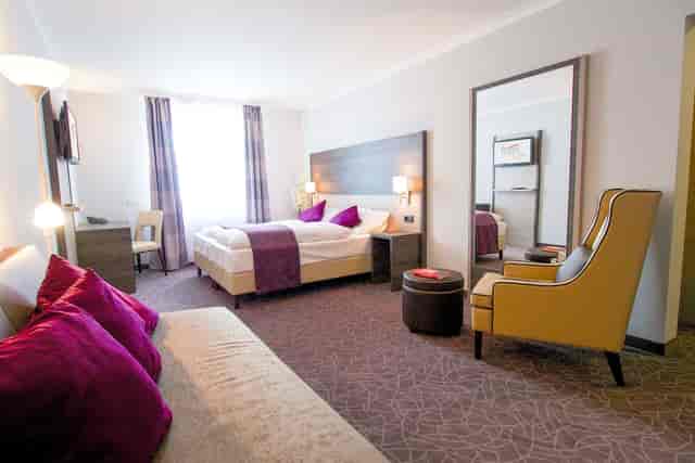 Arion City Hotel room, compact business hotel for overnight stays and corporate travel.