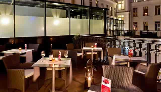 Elegant bar terrace for corporate networking and post-conference cocktail events in Vienna.