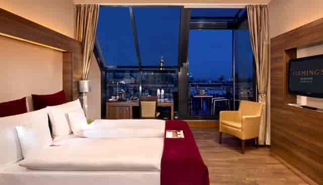 Flemings Selection Hotel Wien-City executive suite with balcony for VIP stays and site inspections.