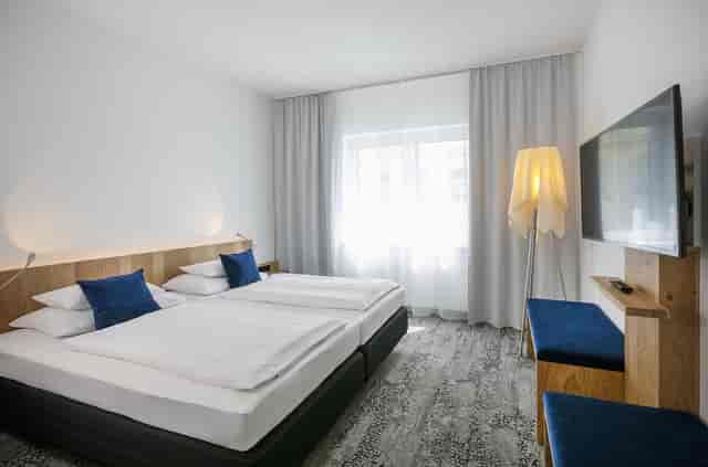 Modern Lohengrin room at ARCOTEL Wimberger Wien for business travel and leisure stays.