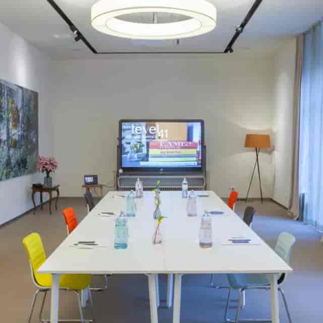 Modern boardroom in Vienna Altstadt with interactive display for executive meetings and strategy.