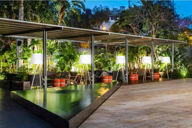 Hotel SB Diagonal terrace with lush greenery for upscale evening networking and cocktail events.