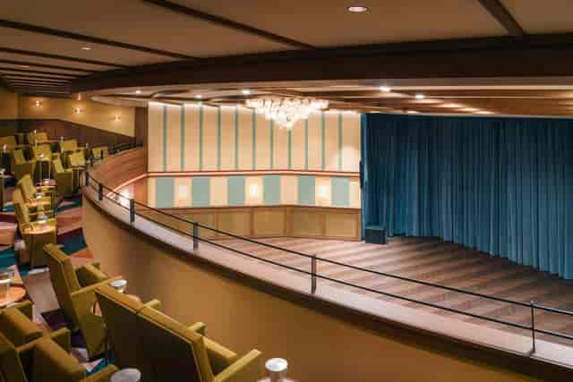 The Apartment at The Hoxton, Vienna: tiered theater venue for upscale corporate events and seminars.