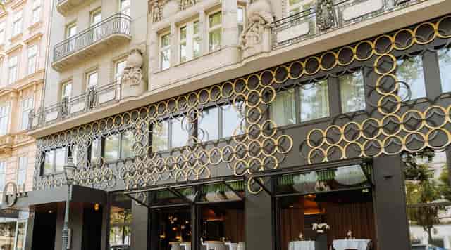 O11 Boutique Hotel living room: modern European design for upscale networking and corporate events.