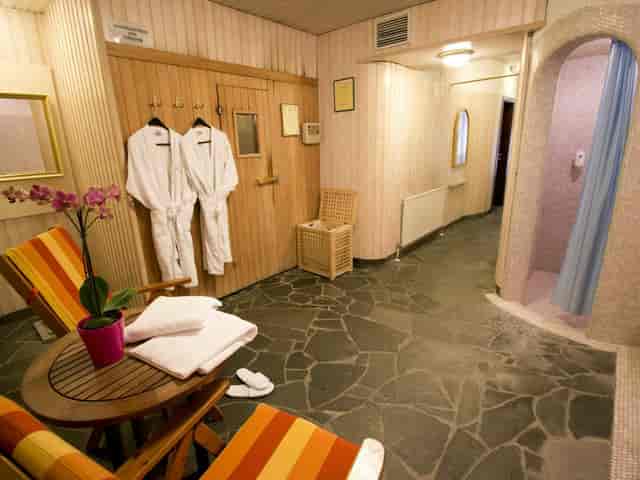 Dated hotel lounge and wellness area for VIP event planning and corporate venue rental.