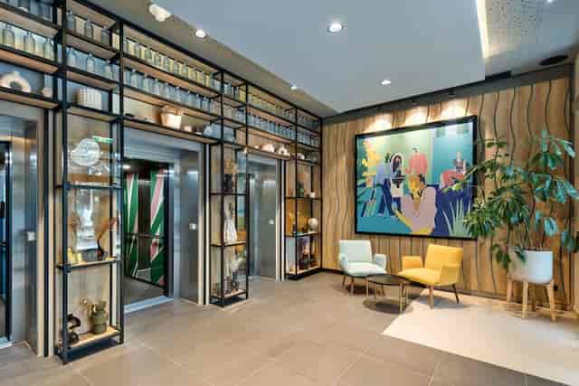 Spark by Hilton Vienna lounge with soft seating for business meetings and corporate events.