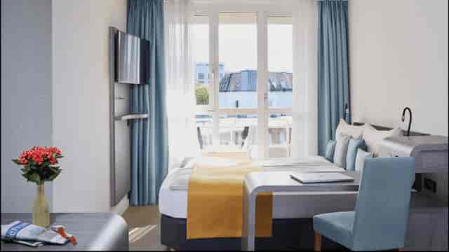 Modern meeting room at Living Hotel Kaiser Franz Joseph for business conferences and workshops.