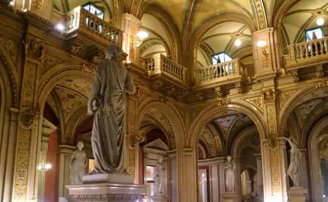 Grand staircase at Vienna State Opera: marble architecture for classical concerts and gala events.