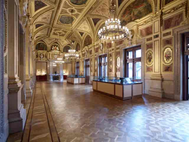 Vienna State Opera ballroom with ornate chandeliers for premium gala receptions and events.
