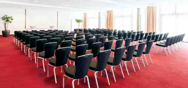 Theater-style conference center in Vienna for corporate events and seminars with natural light.