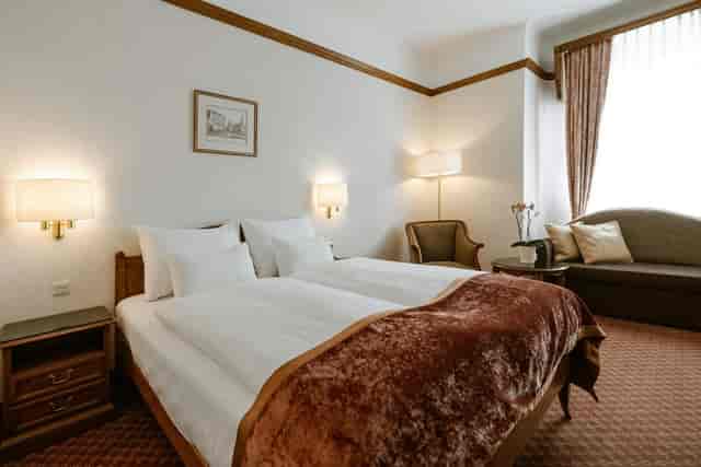 Twin hotel room at Hotel City Central for conference guest blocks and event accommodation.