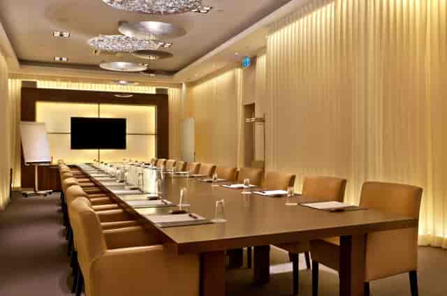 Modern boardroom meeting room at Hotel City Central for executive corporate events.