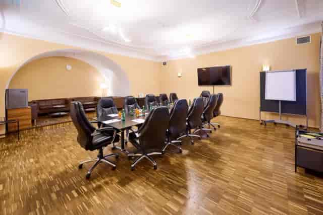 Hotel City Central boardroom with ergonomic chairs for professional corporate meetings and events.