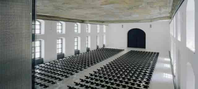 Jesuitensaal with historic frescoed ceiling, ideal for theater-style conference and gala events.