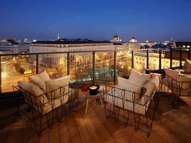 Rooftop restaurant in Vienna at twilight, ideal for VIP receptions and exclusive networking events.