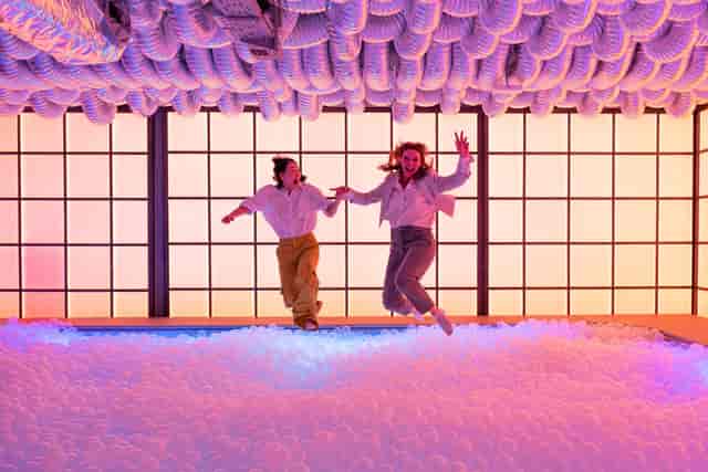 Interactive ball pit in IKONO Vienna event space, featuring dynamic LED lighting for social events.