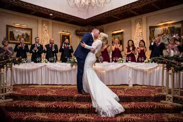 Civil wedding head table with floral decor at Cabra Castle for luxury marriage ceremonies.