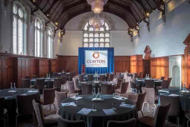 Thomas Prior Hall banquet room with wood paneling, ideal for corporate conferences and events.
