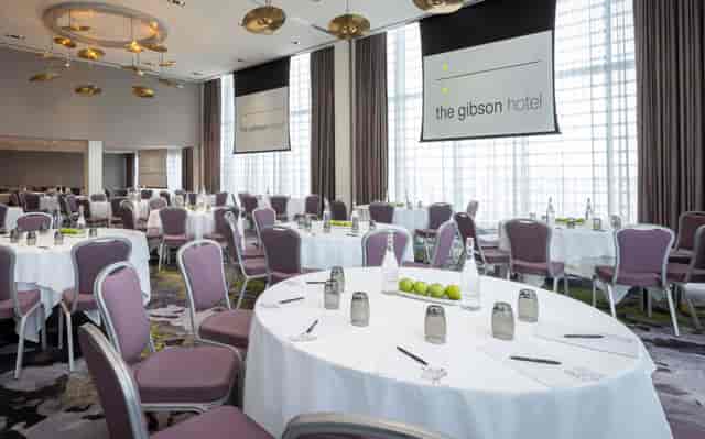 McGettigan Hotel ballroom with floor-to-ceiling windows for corporate events and workshops.