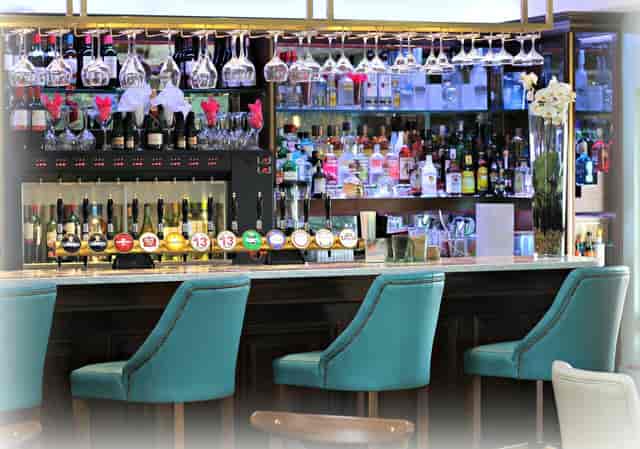 Elegant hotel bar in Hanger 6, perfect for corporate networking and conference receptions.