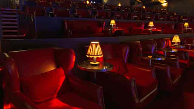 Luxury VIP cinema theater at The Devlin, featuring tiered seating for exclusive event screenings.