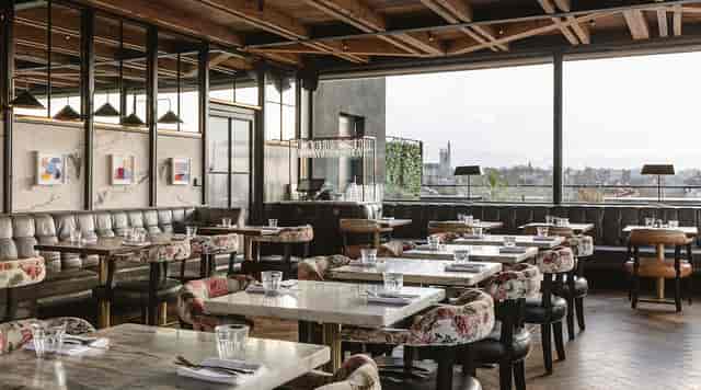 Industrial-chic private dining venue for corporate networking and product launches at The Devlin.