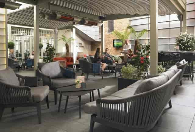 Outdoor breakout space at The Nurserie, Dylan Hotel, for luxury networking and corporate events.
