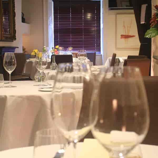 Upscale private dining at Dax Restaurant with elegant table settings for corporate events.