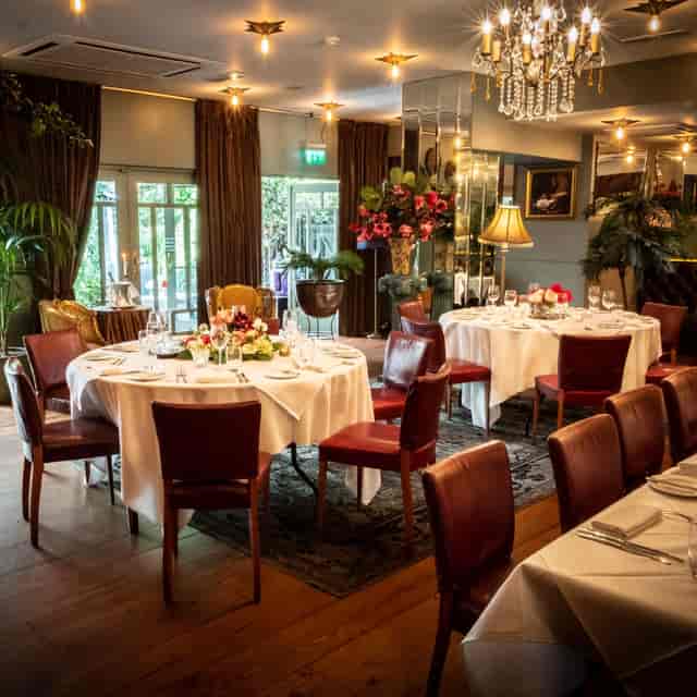 Upscale Main Dining Room at Marco Pierre White Donnybrook, perfect for private corporate events.