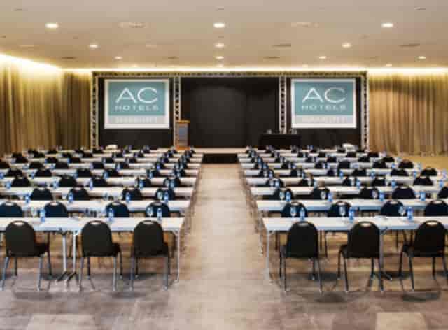 Classroom-style Sagrada Familia meeting room at AC Hotel Barcelona Forum for corporate events.