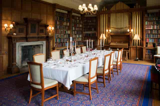 Wood-paneled boardroom in Carberry Tower for executive dinners and corporate meetings.