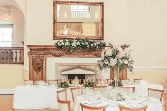 Winchester Suite at Farnham Castle with banquet setup for elegant weddings and corporate events.