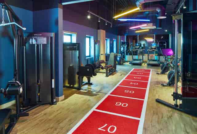 Modern hotel fitness center for corporate conferences and wellness events.